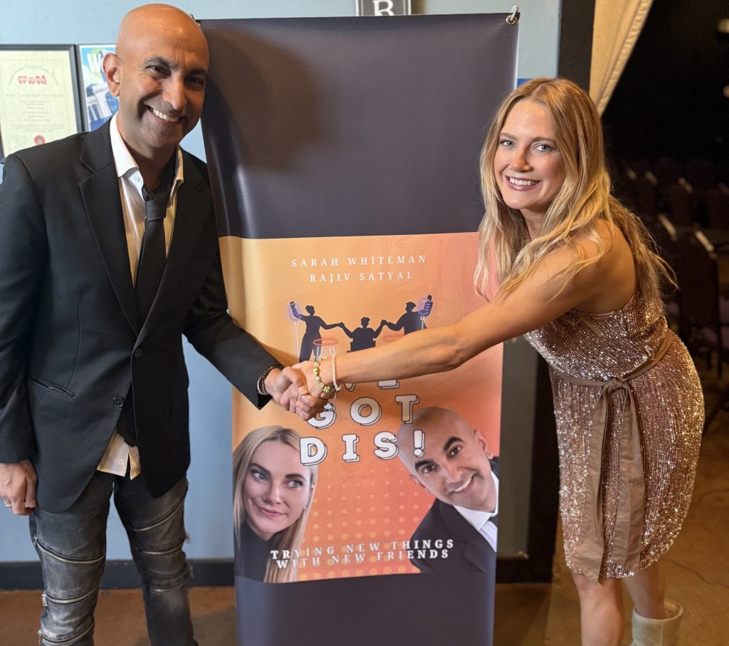 Two people shake hands