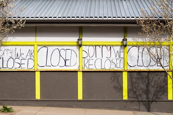 "closed" written on a building