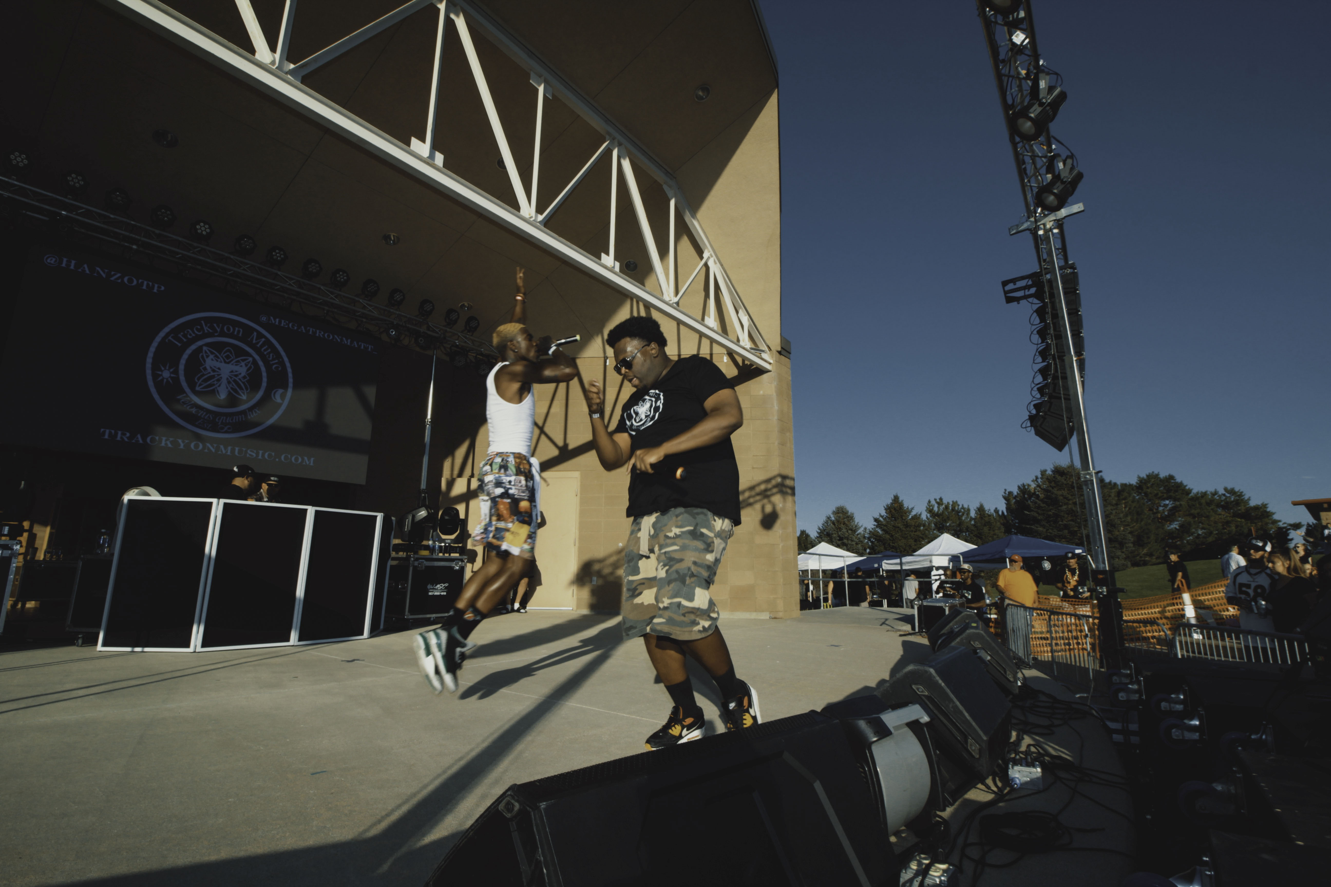 man jumping on stage
