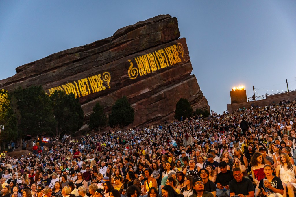 Red Rocks during Louis Tomlinson with 'How Did I Get Here' covering the iconic Red Rock stones.