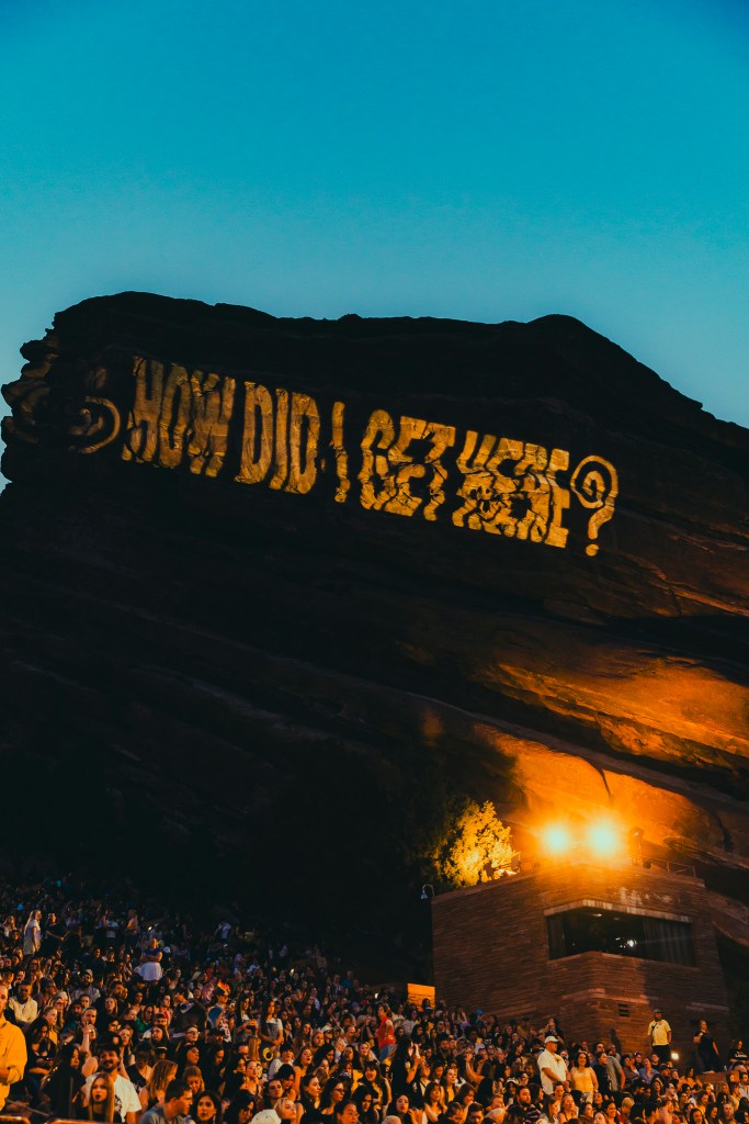 Red Rocks during Louis Tomlinson with 'How Did I Get Here' covering the iconic Red Rock stones.