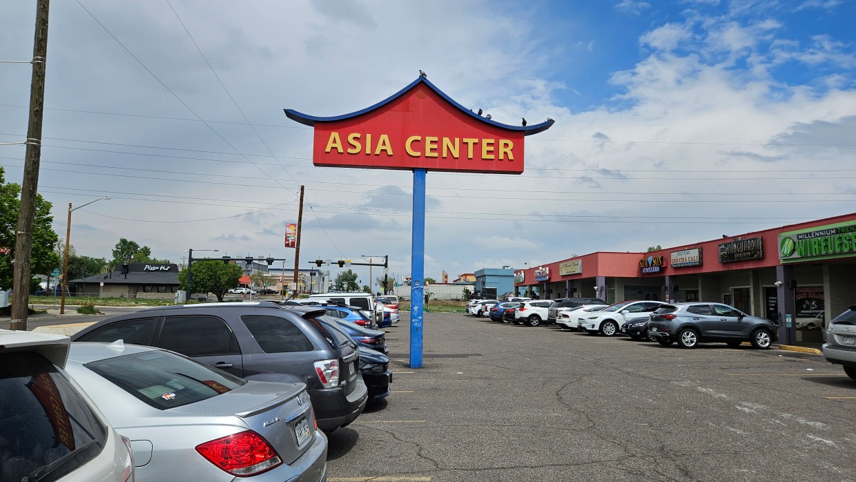 asia center sign over strip mall