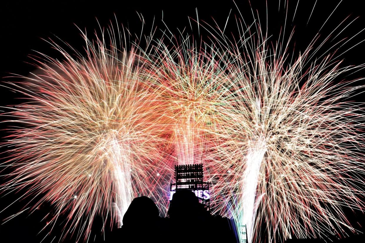 Fireworks lighting up the night sky over Coors Field