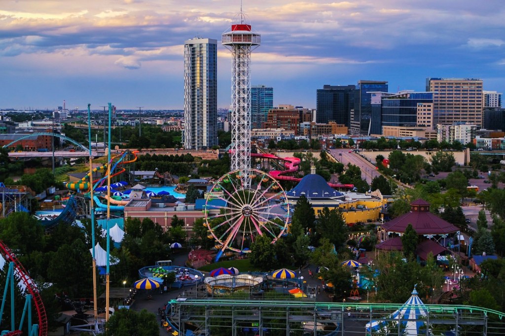 An aerial view of Elitch Gardens' Ferris wheel, water slides and other attractions