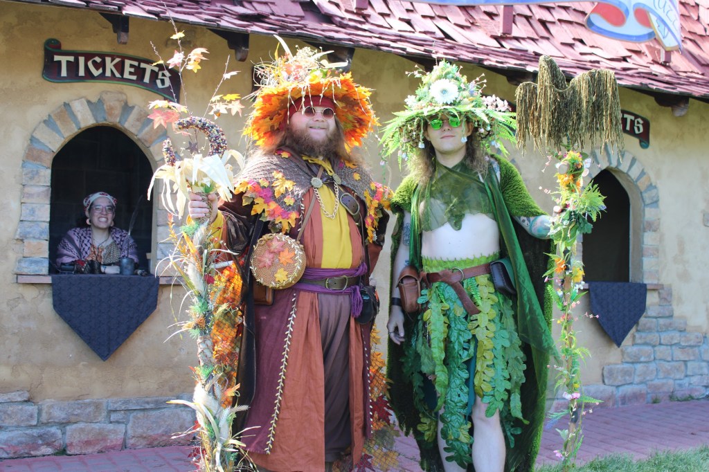 People pose outside the Colorado Renaissance Festival box office