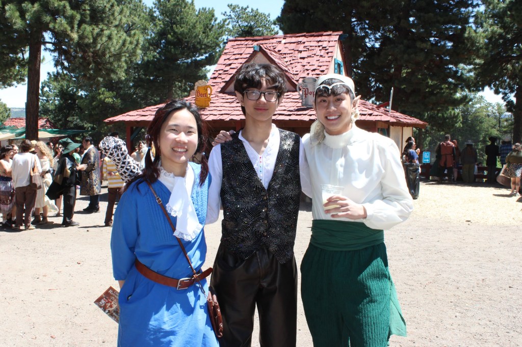 Three people at the Ren Faire