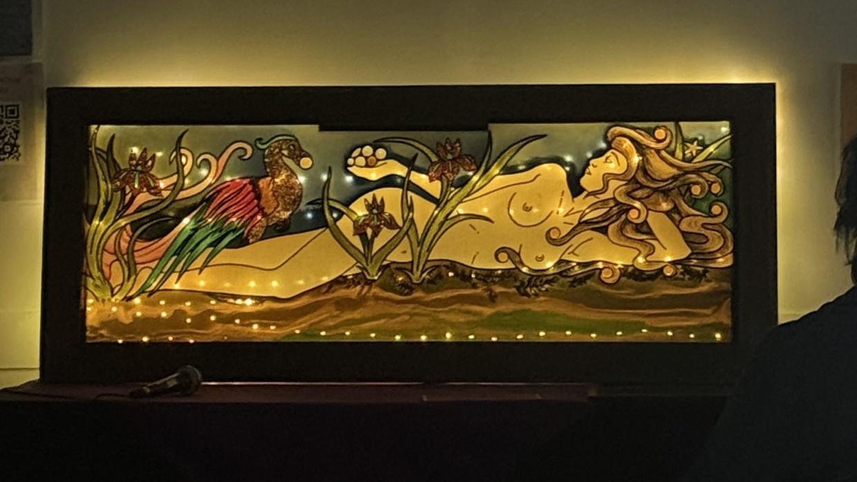 stained glass art of a naked woman