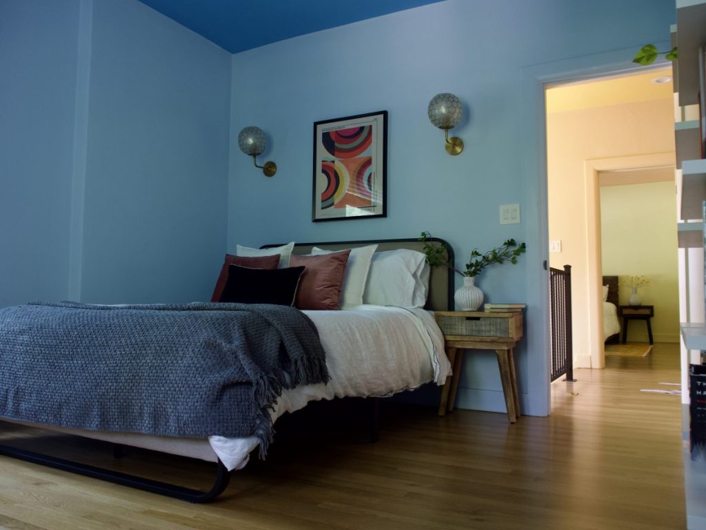 A soothing blue bedroom.