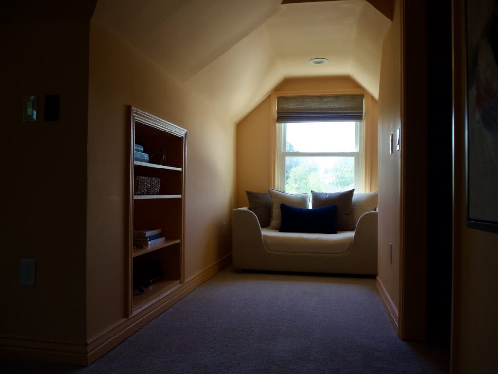 A reading nook in the largest bedroom.