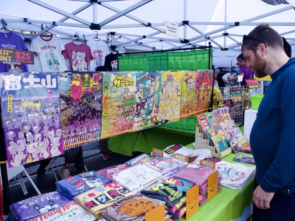 A man looking at merchandise