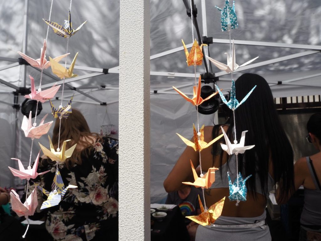Origami hangs from a booth at the Denver Cherry Blossom Festival.