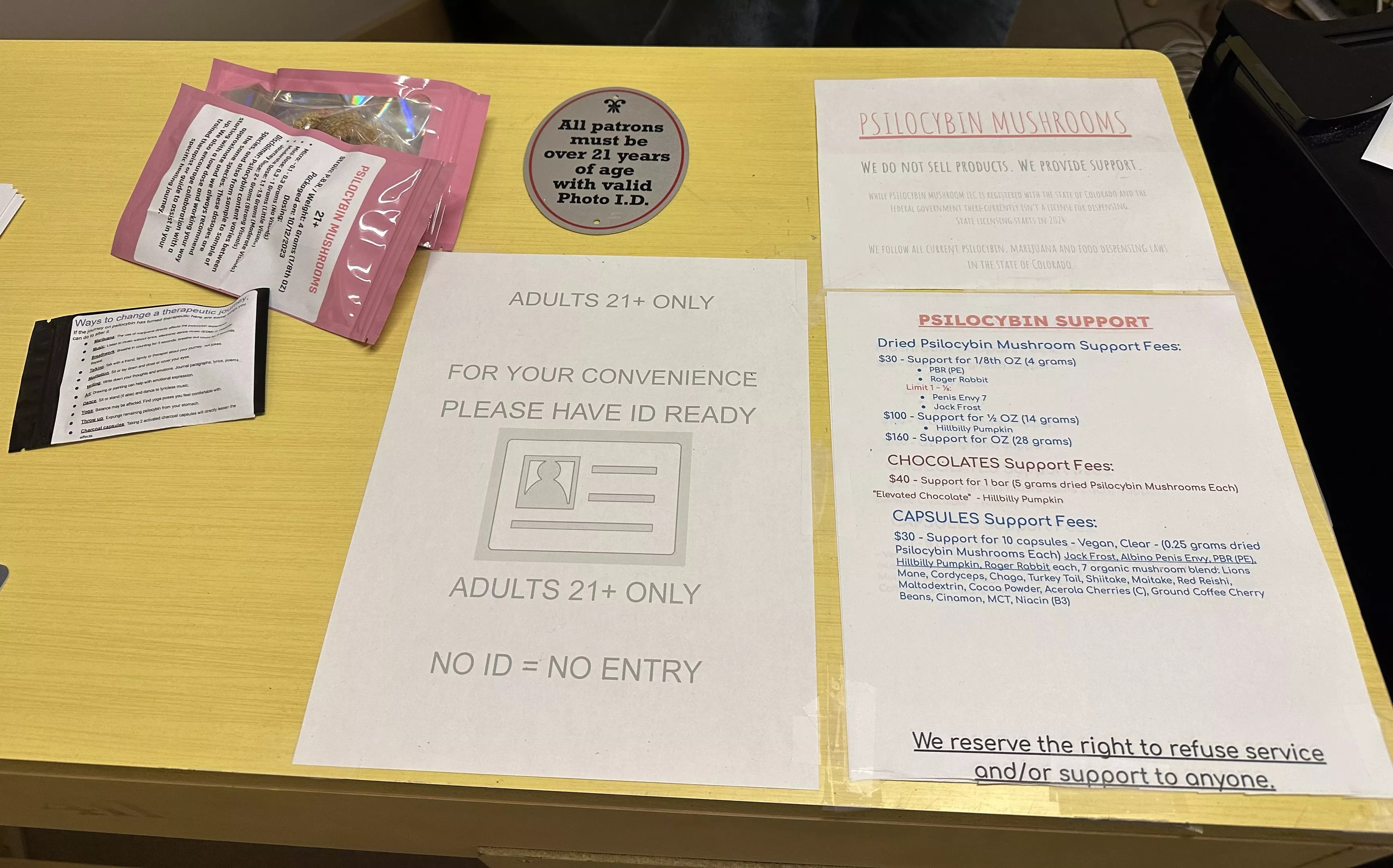 the welcoming desk at an unlicensed psilocybin co-op in Denver
