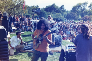 jerry garcia performing in city park in Denver in 1967