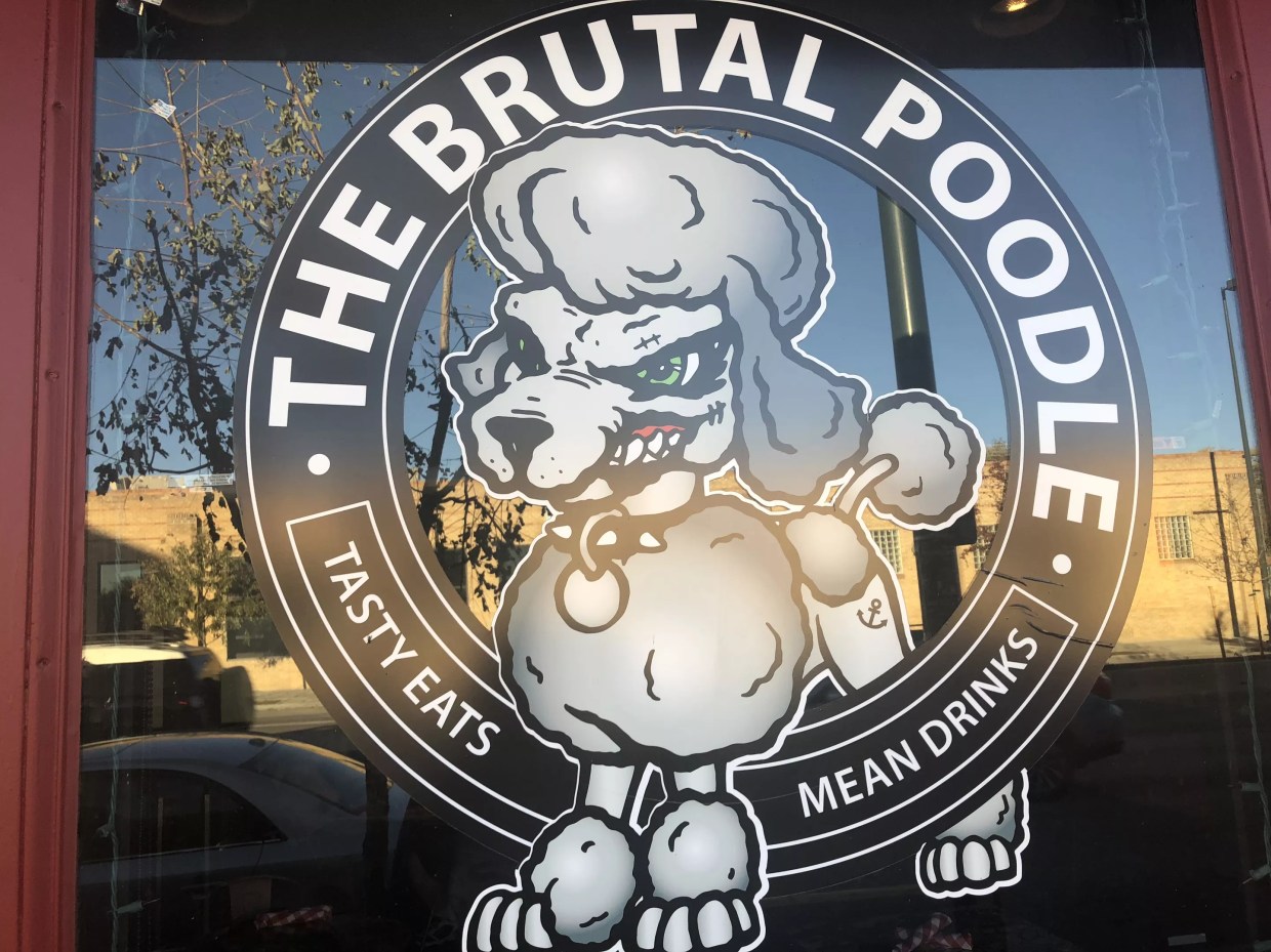 The Brutal Poodle Wins When it Comes to Bar Names — and Neighborhood Fun