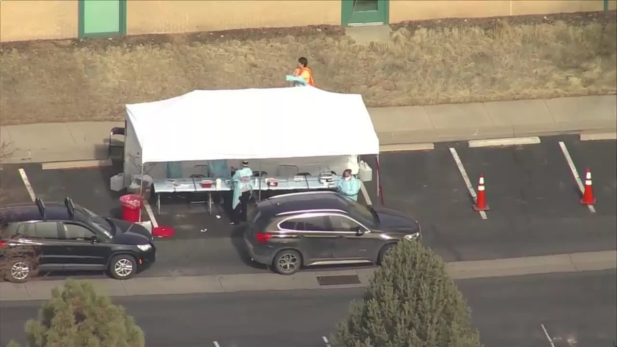 Polis Deploys National Guard to Control COVID-19 Drive-Up Lab Crowd