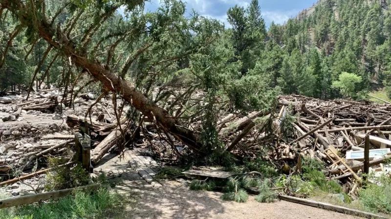 Photos: Flooding Causes Death, Debris, Delays