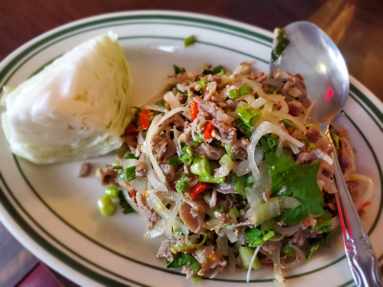 Short Stop: Flip Through the Binder of Asian Specialties at Woody’s Wings & Things