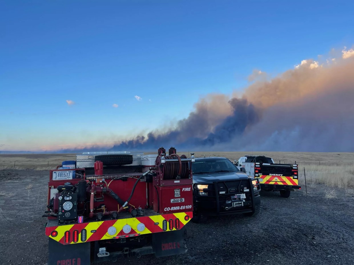 Emergency responders monitor a wildfire in Colorado
