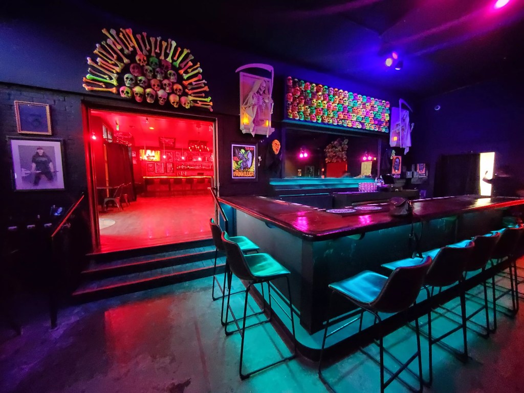 interior of a bar with colorful lighting