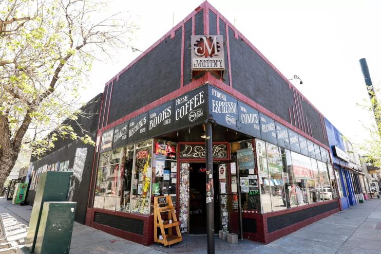 a bookstore at the corner of a street