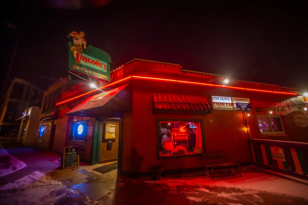 bar with neon lights outside
