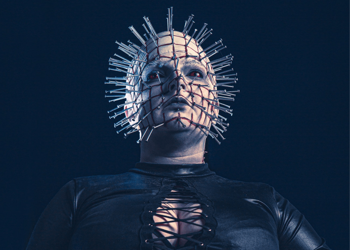 a cosplayer with nails coming out of their face