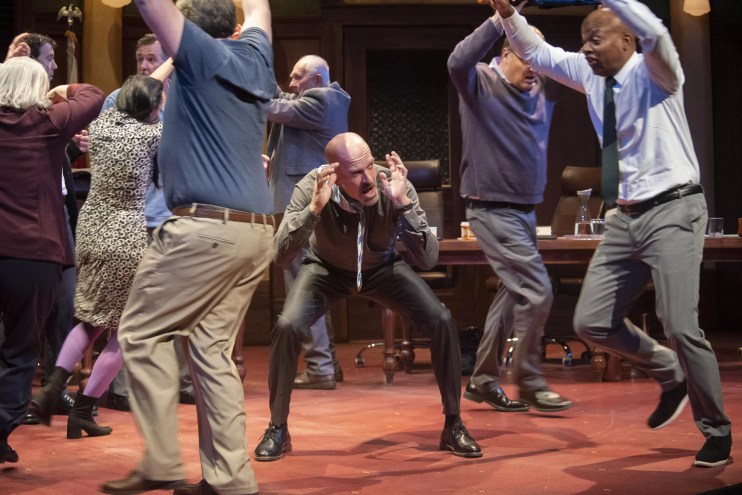 actors on a stage screaming