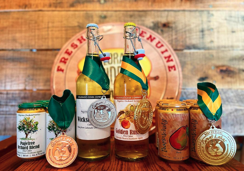 bottles of cider with medals on them