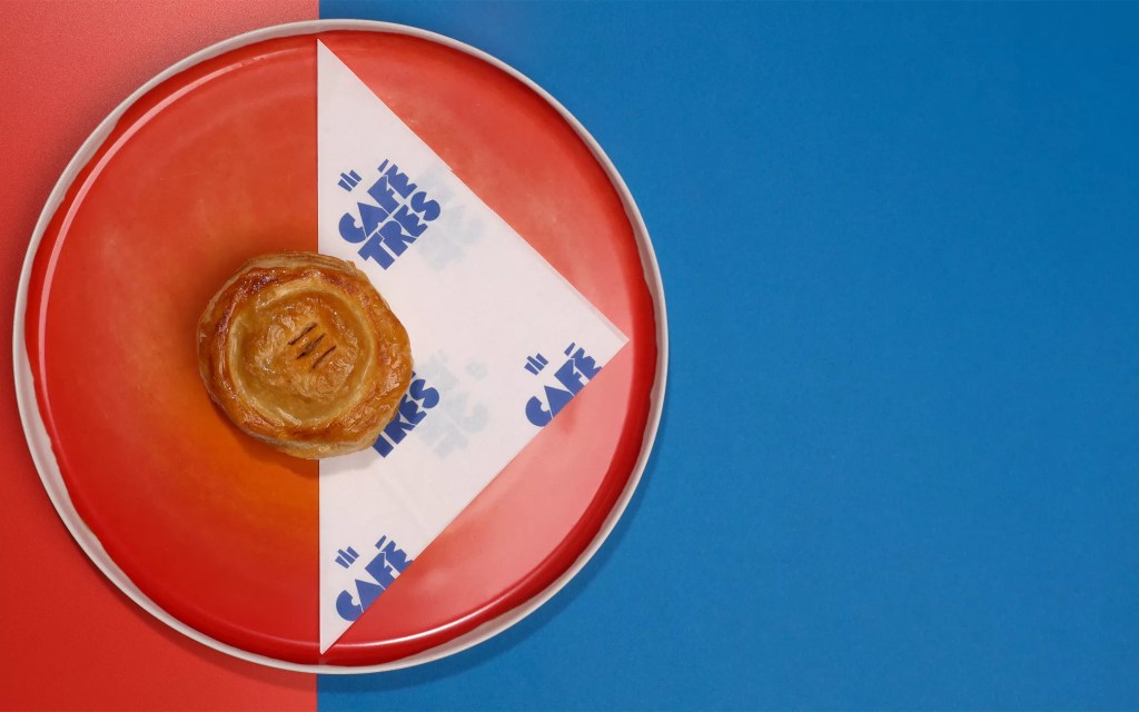 a pastry on a red plate