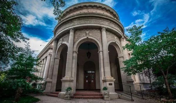 a neo-classical building with columns
