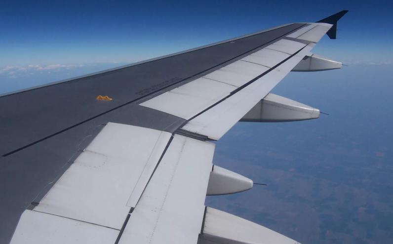 airplane wing in the sky
