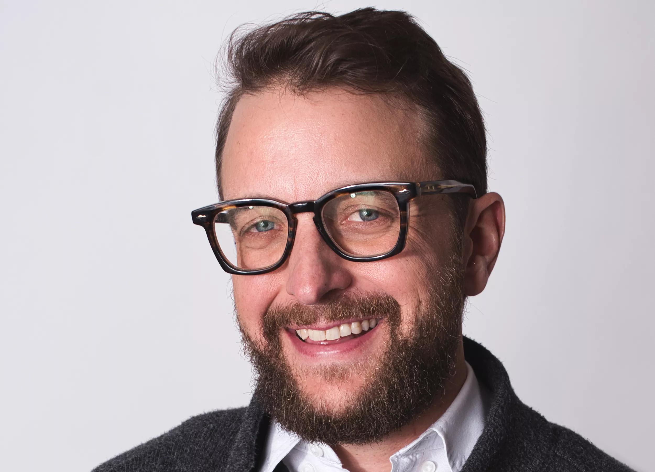 man in glasses, sweater
