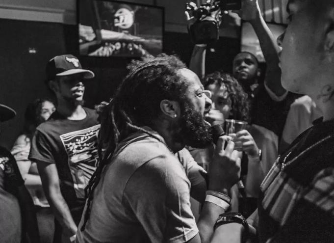 rapper at an open mic