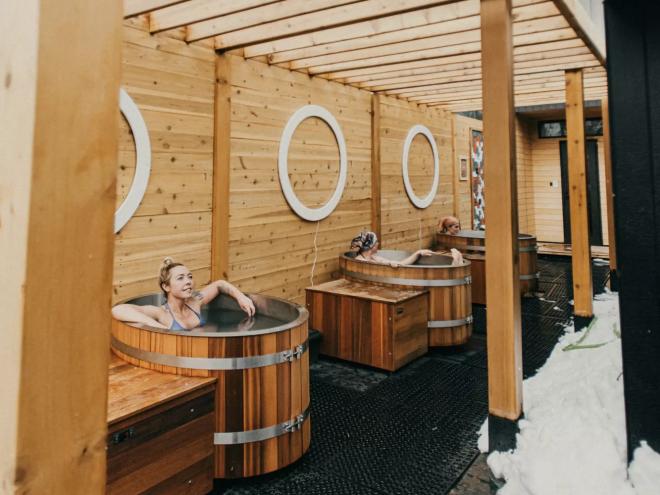 People soaking in cold plunge pools at Portal Thermaculture
