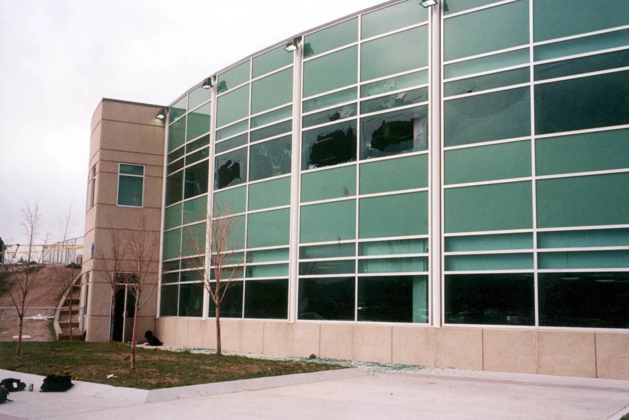 school with windows shot out