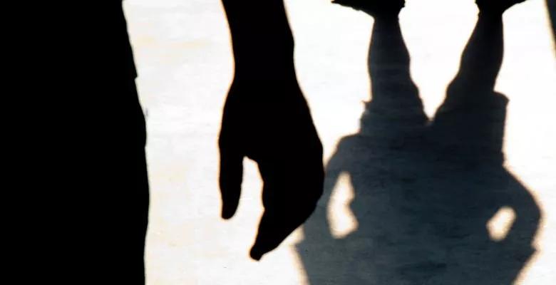 menacing shadow over kid
