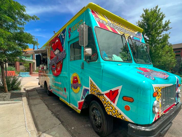 a teal blue food truck
