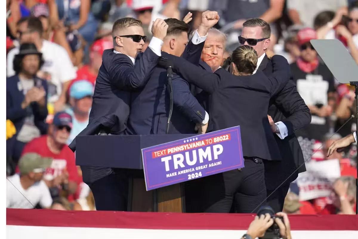 trump surrounded by security after shooting
