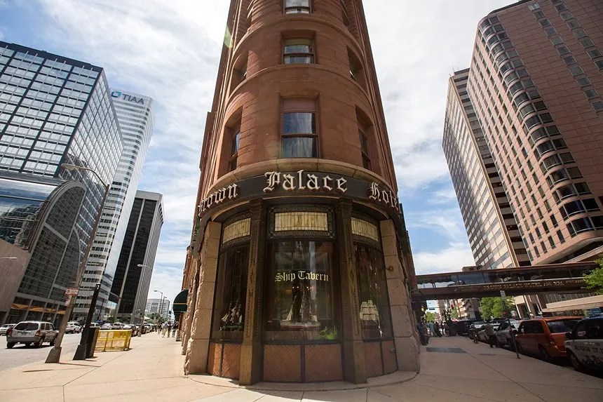 The red brick exterior of The Brown Palace Hotel