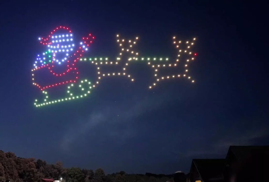 santa figure in lights in sky
