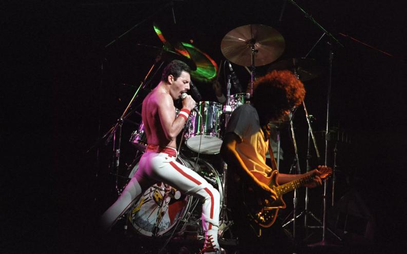 A young Freddie Mercury performing with Queen.