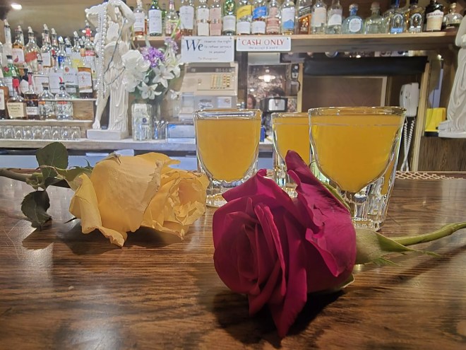 roses and shots on a bar