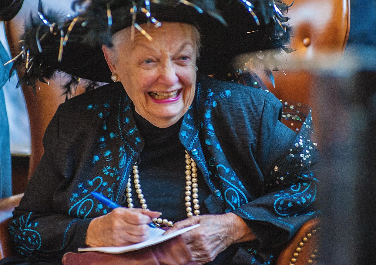 woman smiling in hat