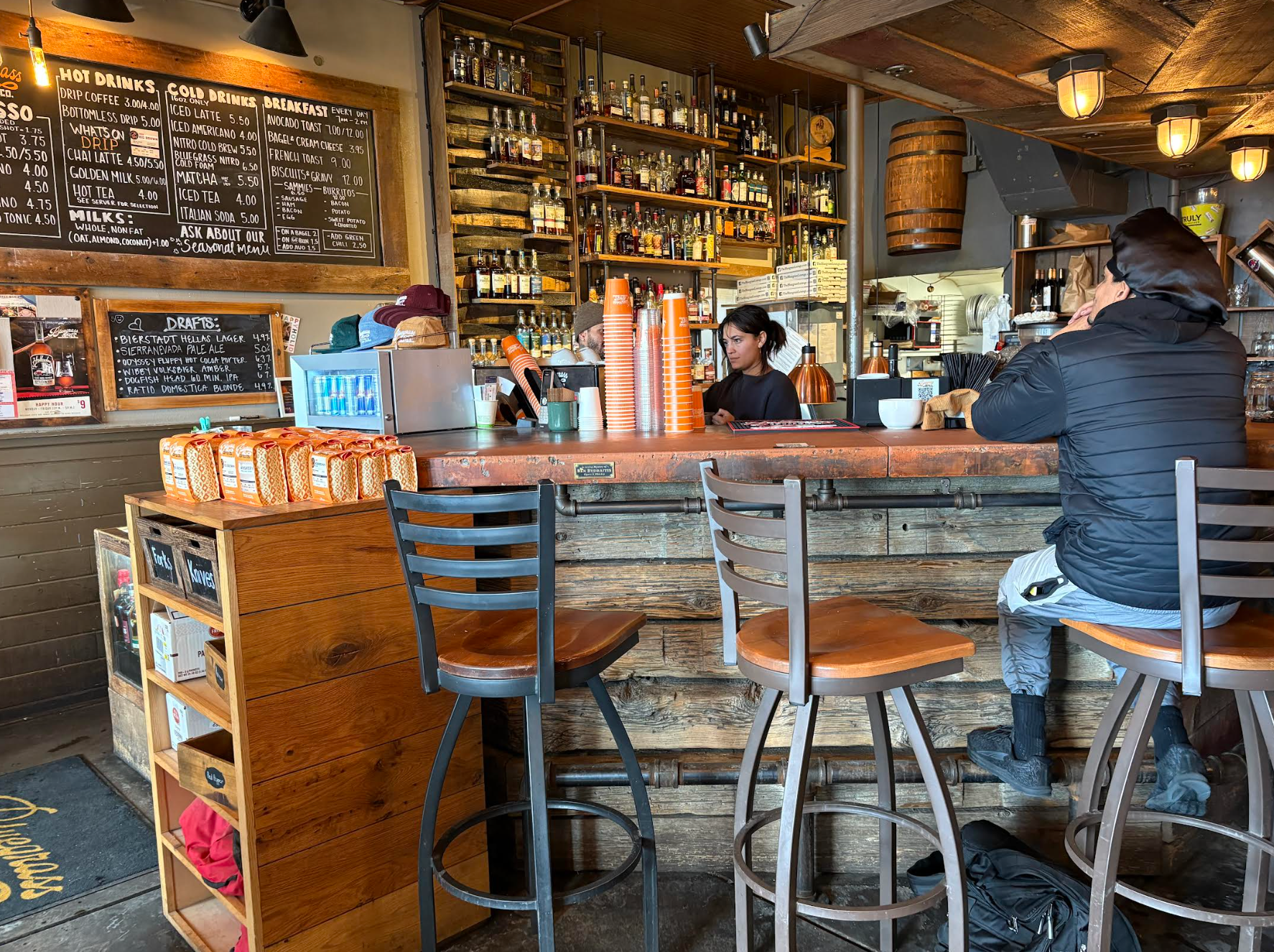A person sitting at a bar