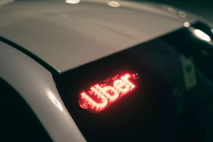 Uber car with lit up sign