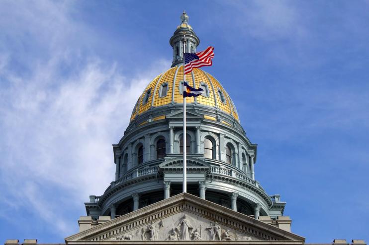 Colorado capitol with flag
