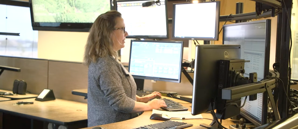 woman answering 911 calls