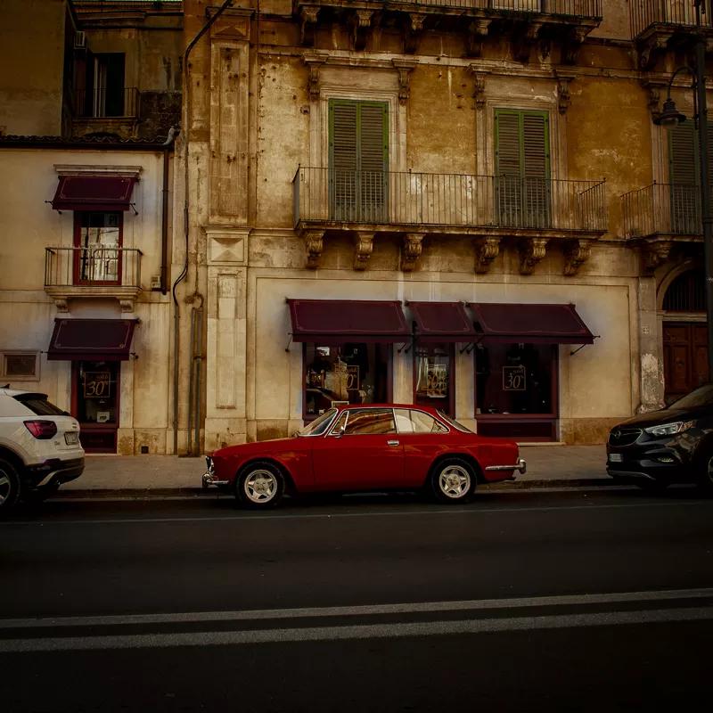 A photo of a red car.