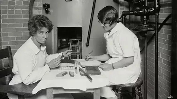 two female students cooking