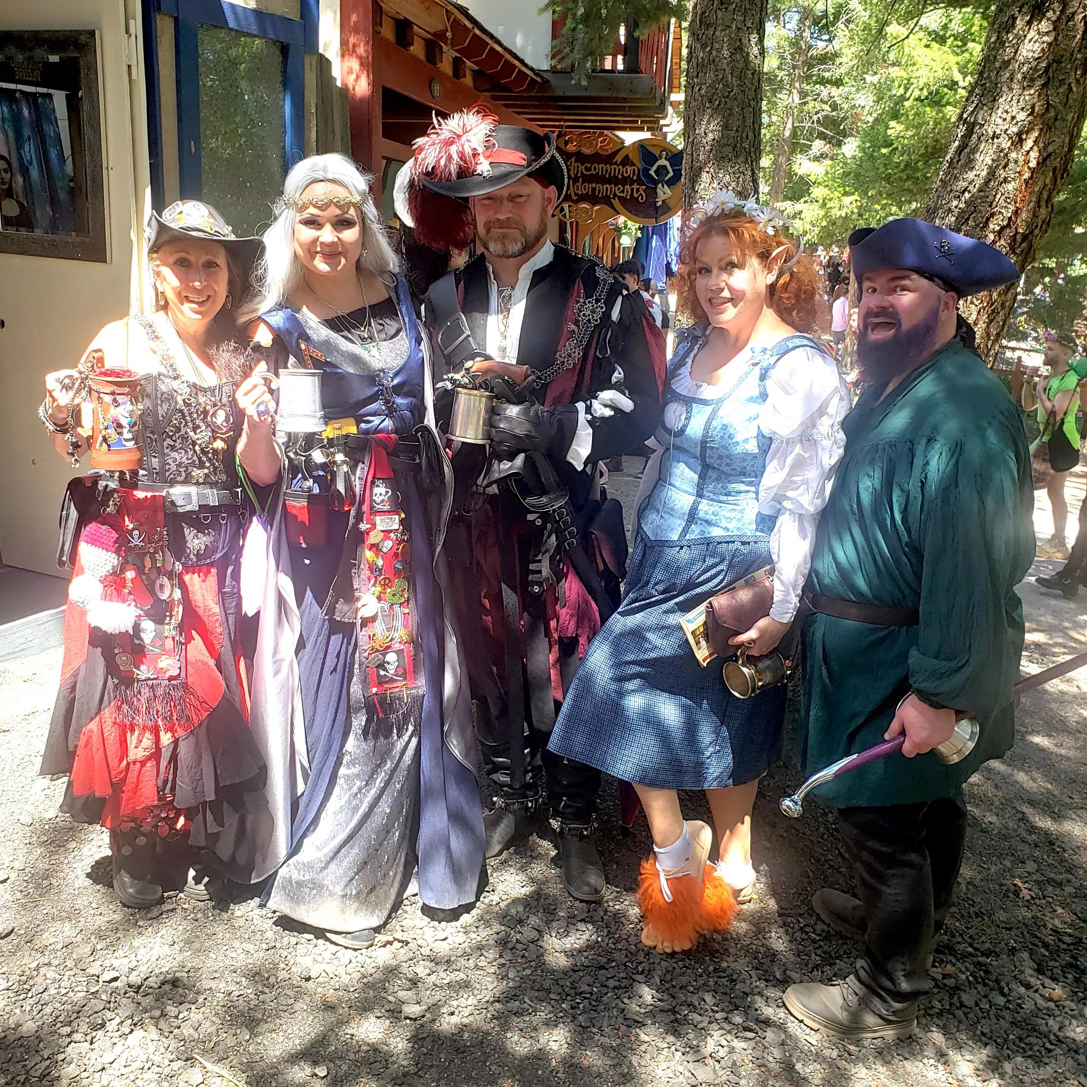 A group of people in Renaissance Festival outfits.